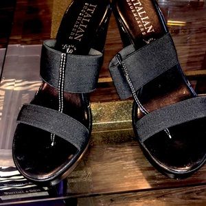 Black Italian shoemakers platform sandal.